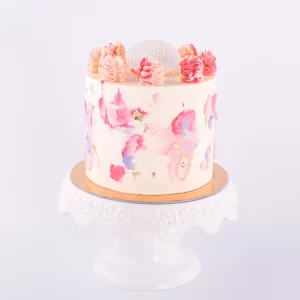 pink and purple colour splash cake by jeanettes cake bakery in oakville